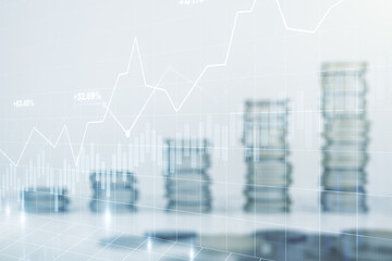 Abstract virtual financial graph hologram on stacks of coins background, forex and investment concept. Multiexposure