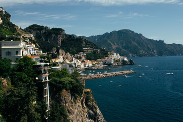 Fototapeta premium The Amalfi coast with Positano. One of the most visited places in the world in summer. Clean and clear waters where to go by boat or on a boat or rather a yacht 