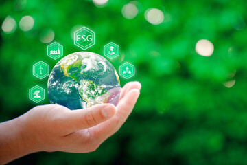 ESG. environment social governance investment business concept. Businessmen to analyze ESG, business investment strategy concept. Elements of this image furnished by NASA.