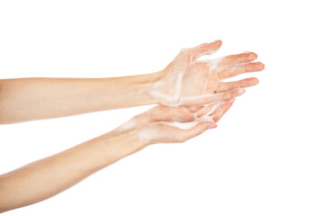 Woman thoroughly washing her hands isolated on white background. Soap foam on female hands.