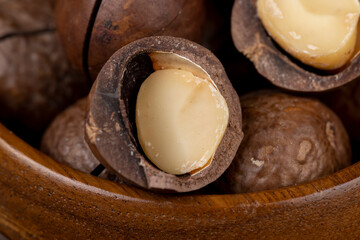 Unpeeled macadamia nuts on the table