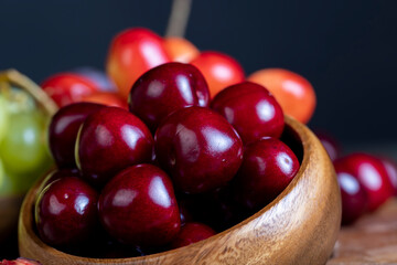 Sweet fresh cherries with other products