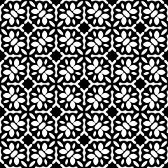 Geometric pattern in ethnic style. Seamless background  with  abstract shapes. Black and white wallpaper. Abstract background  with Repeating pattern for decor, textile and fabric.