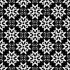 Geometric pattern in ethnic style. Seamless background  with  abstract shapes. Black and white wallpaper. Abstract background  with Repeating pattern for decor, textile and fabric.