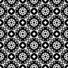 Geometric pattern in ethnic style. Seamless ornament  with  abstract shapes. Black and white wallpaper. Abstract background  with Repeating pattern for decor, textile and fabric.