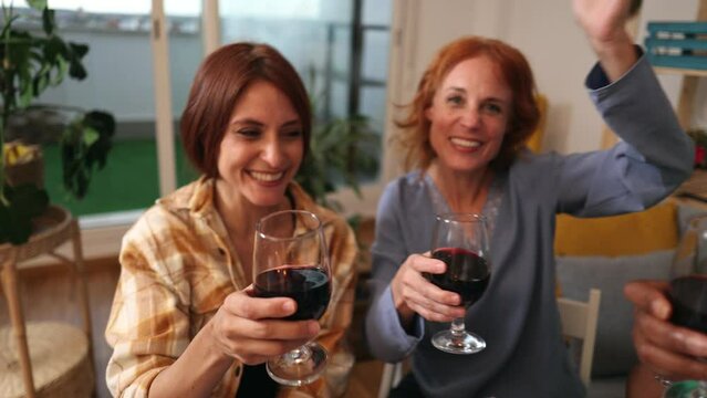 selfie diverse women having dinner and drinking wine, multigenerational