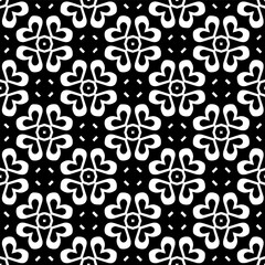 Geometric pattern in ethnic style. Seamless ornament  with  abstract shapes. Black and white wallpaper. Abstract background  with Repeating pattern for decor, textile and fabric.