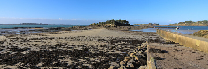 View of sand beach during low tide a winter sunny afternoon, Lancieux, Brittany, north of France