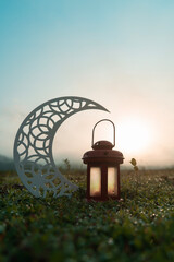 Eid Mubarak concept photography, Ramadan Kareem greetings image, Crescent moon shape with red lantern lamp in the park