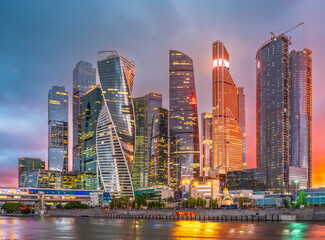 Fototapeta na wymiar High buildings of Moscow-City at Moskva River at summer sunset, Russia.