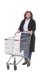 in full growth. casual woman with shopping cart.