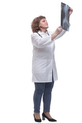 in full growth. the doctor looking at the x- ray