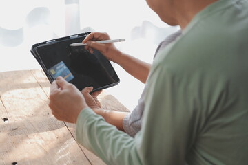 Shocked aged couple become victims of online fraud using credit card phone to pay for goods order service online on suspicious website. Frustrated older spouses overspending money at internet shopping