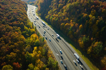 I-40 freeway in North Carolina leading to Asheville through Appalachian mountains in golden fall...