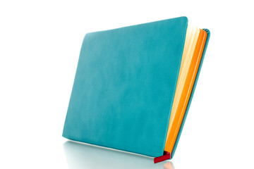 One notebook, macro, isolated on white background.