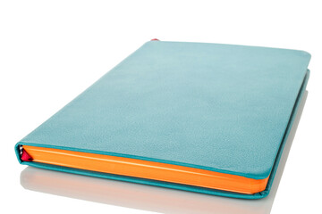 One notebook, macro, isolated on white background.