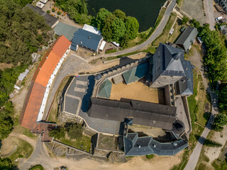 Aerial view of Kost castlein Libosovice , built in high Gothic style, White Tower keep surrounded by 2 concentric walls in the Bohemian Paradise