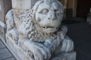 Stone carved Lion at entrance to Church of Saint Paul the Apostle. Ruda Slaska, Poland.
