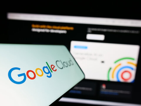Stuttgart, Germany - 06-18-2023: Smartphone with logo of computing services Google Cloud Platform (GCP) on screen in front of business website. Focus on left of phone display.