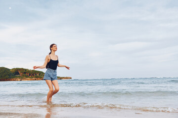 woman young sunset beach summer smile running sea lifestyle walking travel