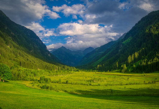 Scenic mountain landscape with beautiful valley and mountain peaks