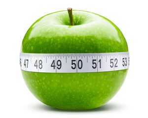 Green apple and soft or flexible tape measure for sewing tailor cloth ruler. Green apple for fat body weight loss. Fitness sport concept. Fresh Granny smith apple. Healthy fruit food. Vegetarian diet 