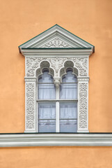 A zoom in on a rococo style window on a building in the Kremlin - Moscow - Russia 