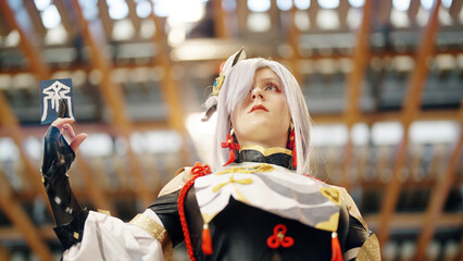 Woman Cosplaying Anime Fighter Character At Anime Convention with Cinematic Look Low Angle