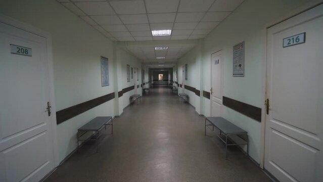 Hospital empty hall corridor with cabinets, clinic, of a large building. Quarantine.