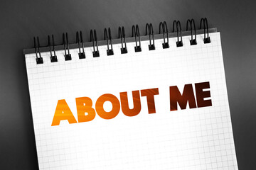 About Me text on notepad, concept background