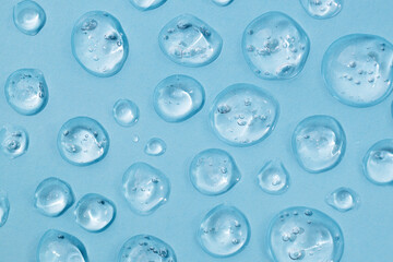 Drops of gel face serum top view. Abstract gel drops for design. Liquid gel moisturizer.