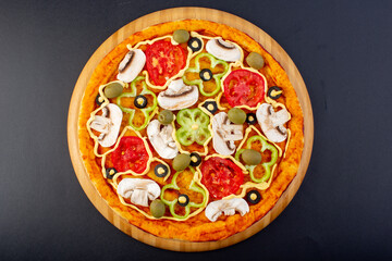 top view delicious mushroom pizza with red tomatoes bell-peppers olives and mushrooms all sliced...