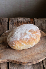 Homemade sourdough bread, side view.