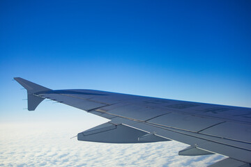 Fototapeta na wymiar Flying - Above the Clouds