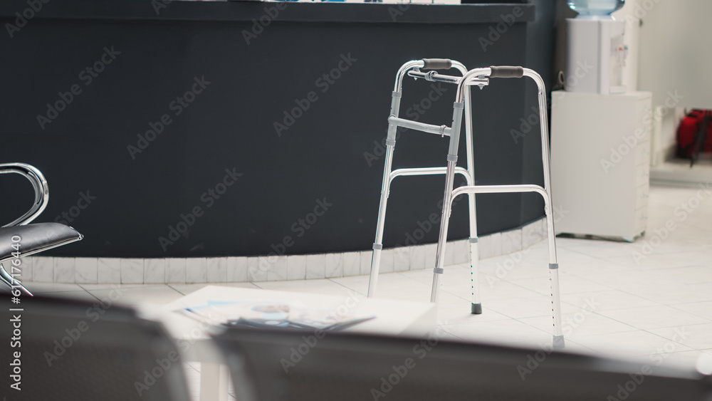 Poster facility waiting room with walk frame in lobby, empty reception counter with checkup forms and seats