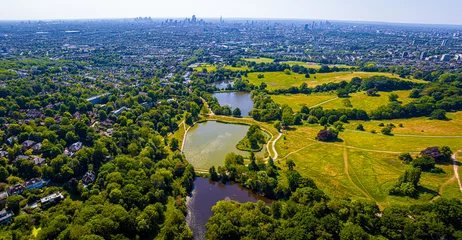 Raamstickers Aerial view of Hampstead Heath, a grassy public space and one of the highest points in London, England © Alexey Fedorenko