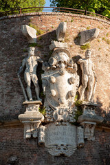 Siena, Italy - 2023, June 24: The Duke Cosimo coat of arms, on the Medici fortress bastion (called San Filippo bastion), sculpted by Francesco Camilliani.
