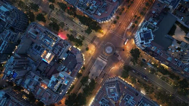 Central areas of Barcelona at night. Top view, filming from a drone.