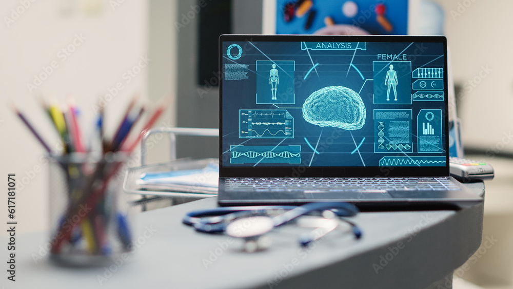 Poster laptop with human brain scan on desk, neurology x ray running on display in empty registration lobby