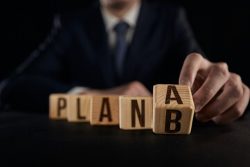 Obraz premium the hand highlights the letter A from the plan