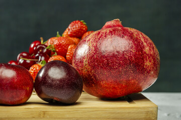 Still life with a ripe pomegranate