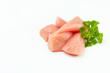 Fresh frozen pieces of turkey meat on a white background.Raw chicken.Frozen chicken fillet.Ogranic food and healthy eating.frozen turkey or poultry meat.