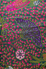 top view of pink and green ankara fabric, flatlay of nigerian wax cloth, pink and green ankara material