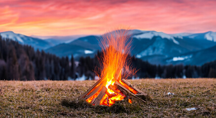 beautiful bonfire set on fire in the middle of a meadow