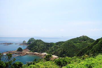 Fototapeta na wymiar 佐多岬の灯台と展望所の見える風景