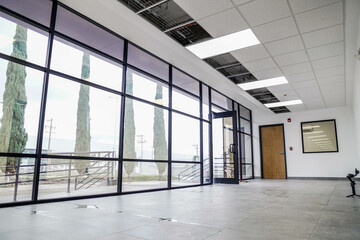 Fototapeta premium White open space office interior, mock up wall, office building interior.