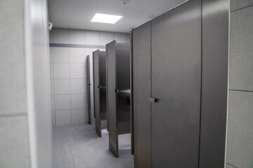 Public toilet shopping. public Interior of bathroom with sink basin faucet lined up Modern design.