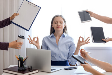 Meditating businesswoman and female hands with supplies in office. Balance concept