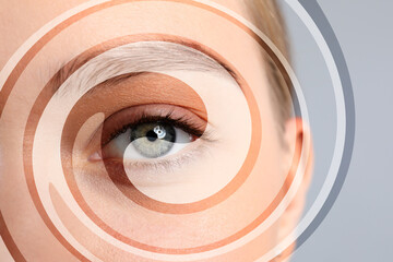 Hypnosis and therapy. Swirl over young woman's face, closeup. Collage design