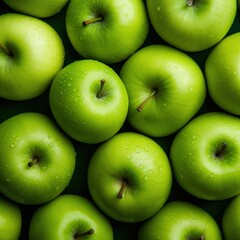 Fresh green apples with water droplets in store, top view